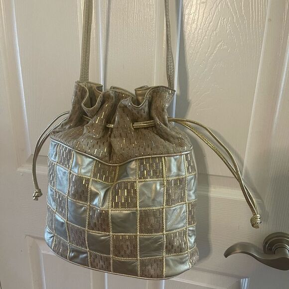 Retro leather Gold and Tan burlap patchwork Bucket stylemedium shoulder bag.